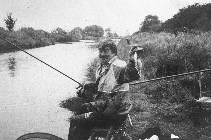 Dick Clegg fishing on the bank during his match angling years