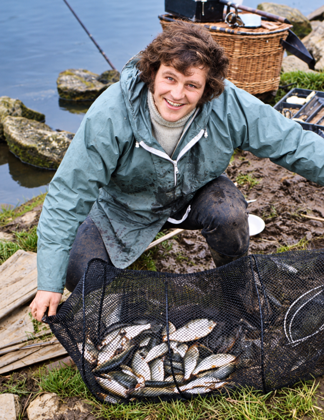 A young Kevin Ashurst with a catch of fish
